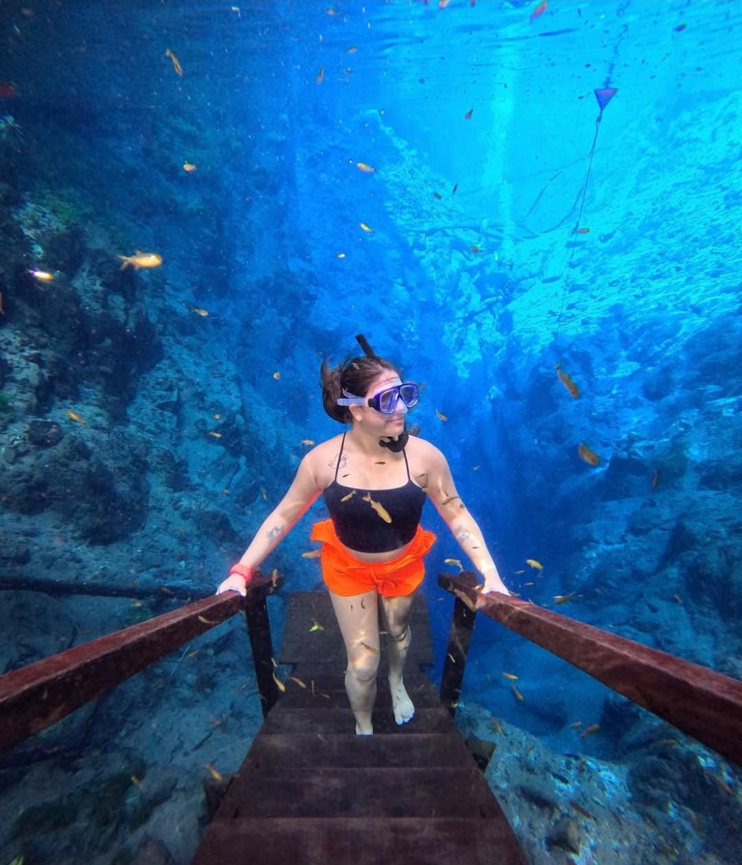 Snorkeling in crystal-clear blue water